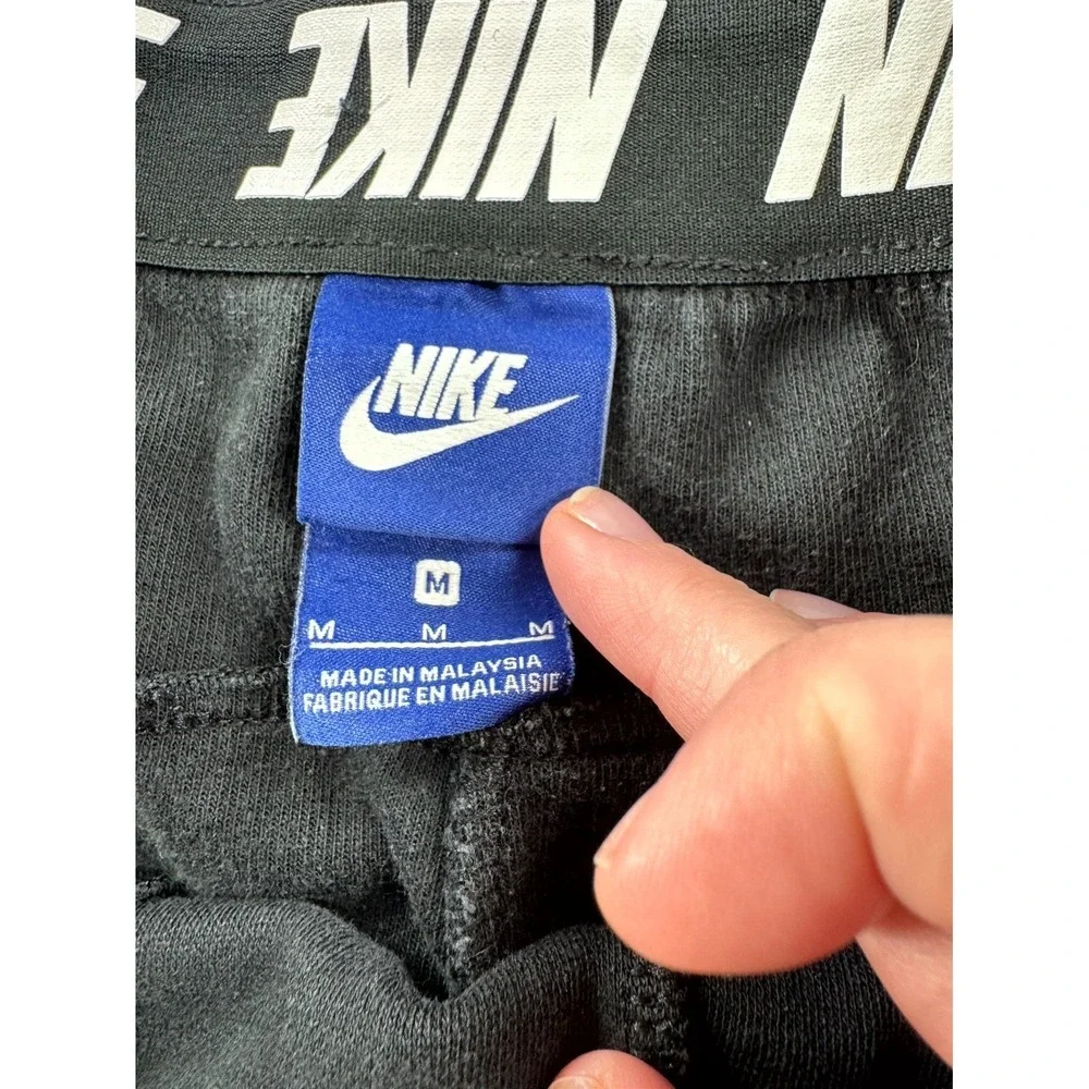 Nike Dri-Fit Jogger Sweatpants Mens‎ Medium Black Drawstring Logo Pull On Sports